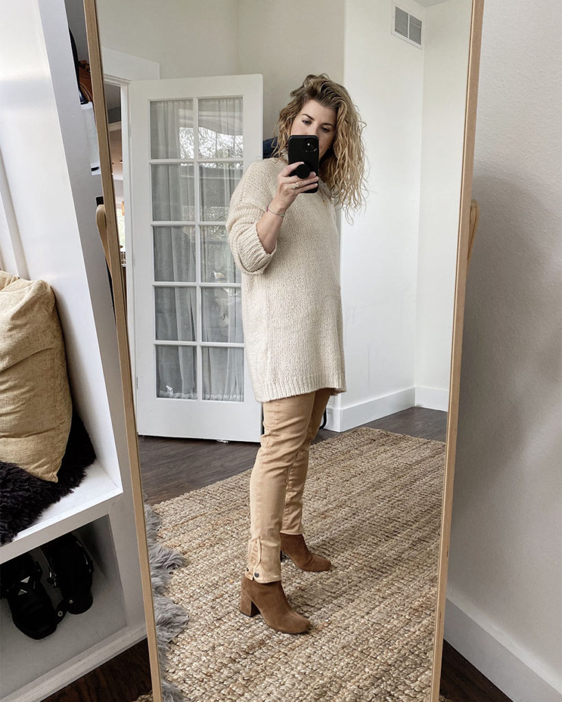 Sweater Outfit 3 - a mirror selfie of a white woman with wavy blonde hair wearing a cream crew neck long sweater over a pair of tan pants. She has a grey scarf tied around he neck and is wearing brown suede boots. The next 2 photos are closeups or different angles.